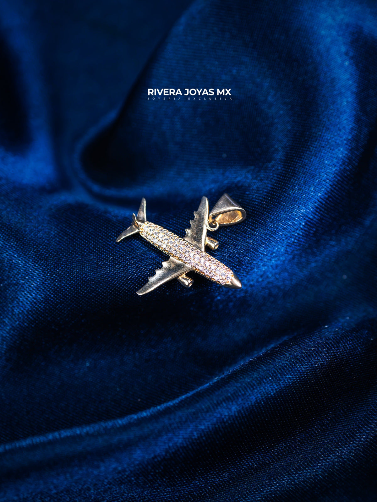Dije de avión con piedras 10k