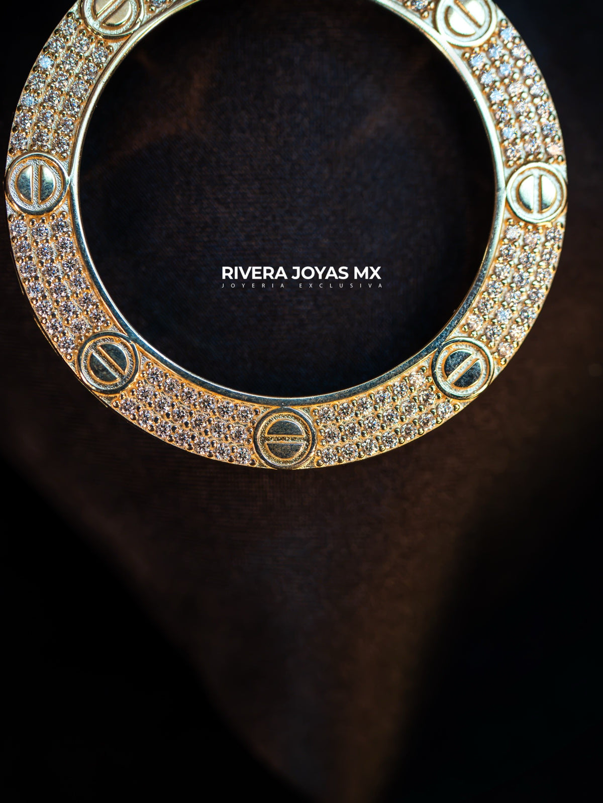 Bisel para centenario con zirconias suizas largas 4.7 cm 10k