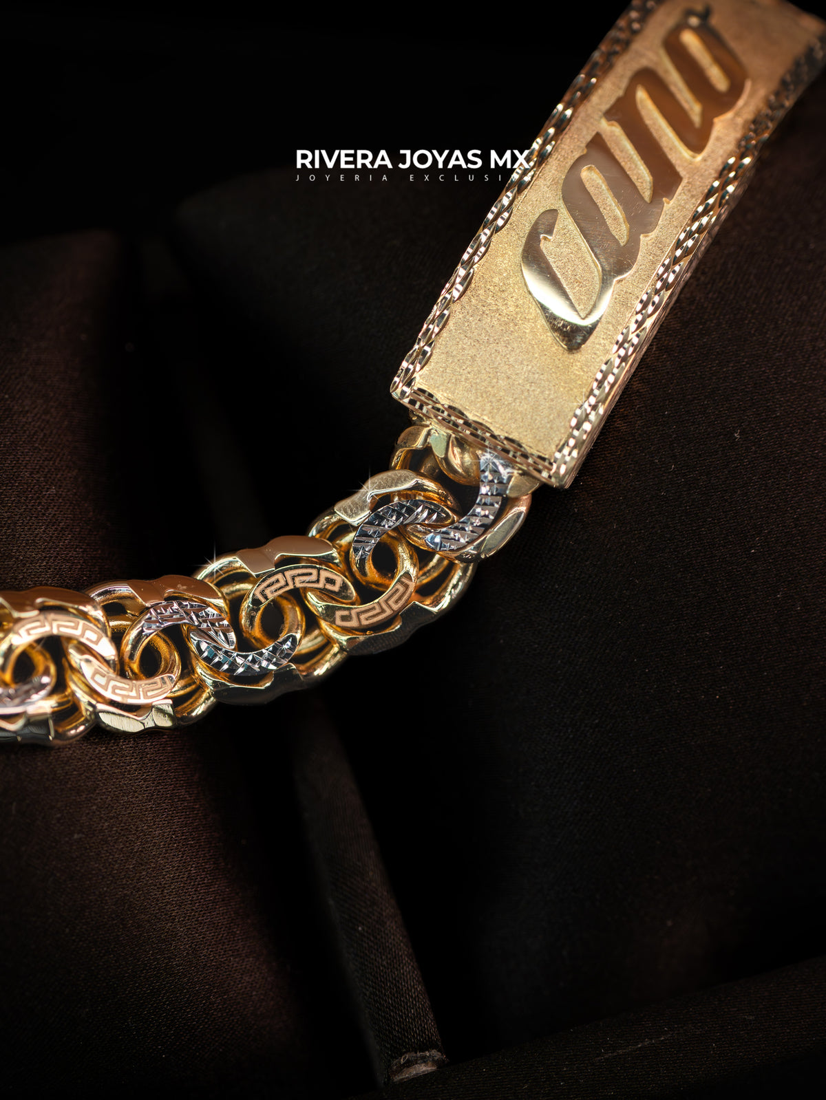 Esclava Palomar con eslabones de grecas y diamantado caballero